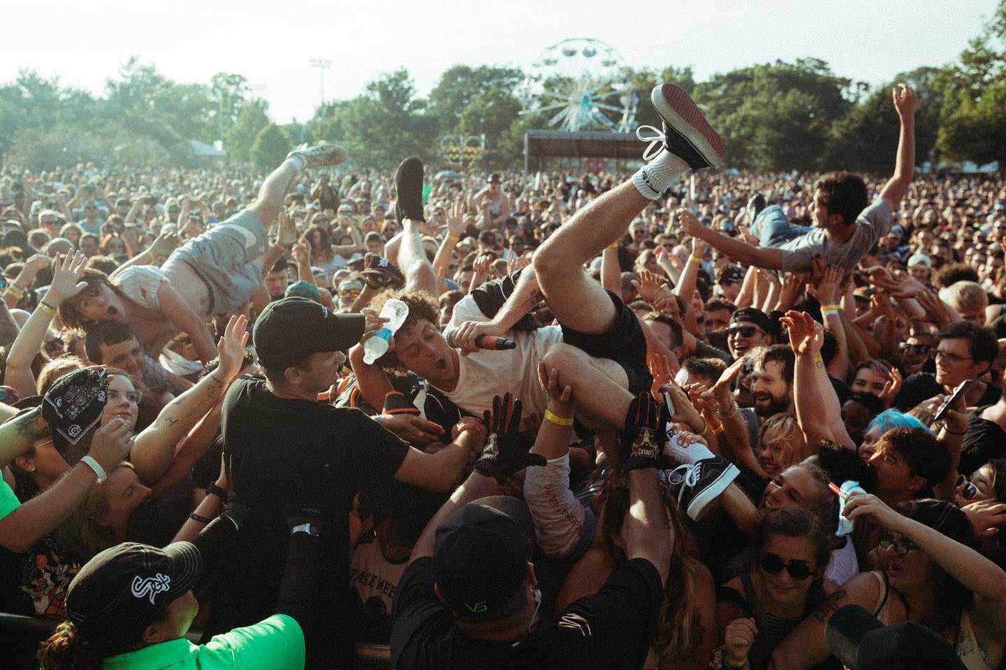 Image of the crowd surfers at Fiddler's Green Amphitheatre in Greenwood, Colorado