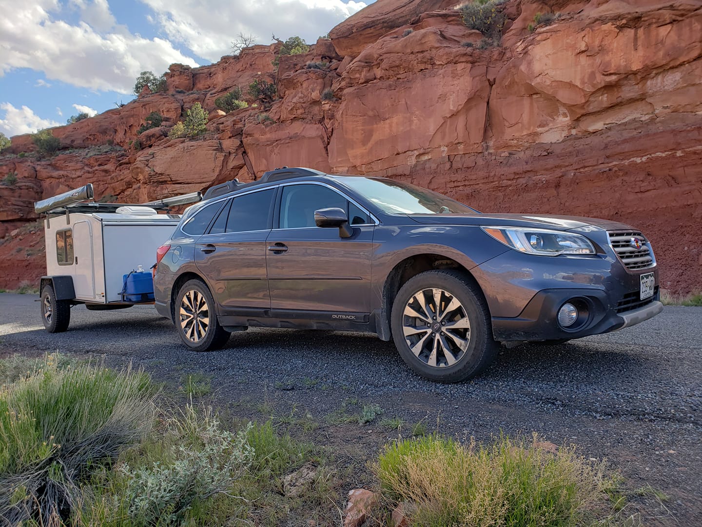 Image of a Subaru towing a Hiker Trailer