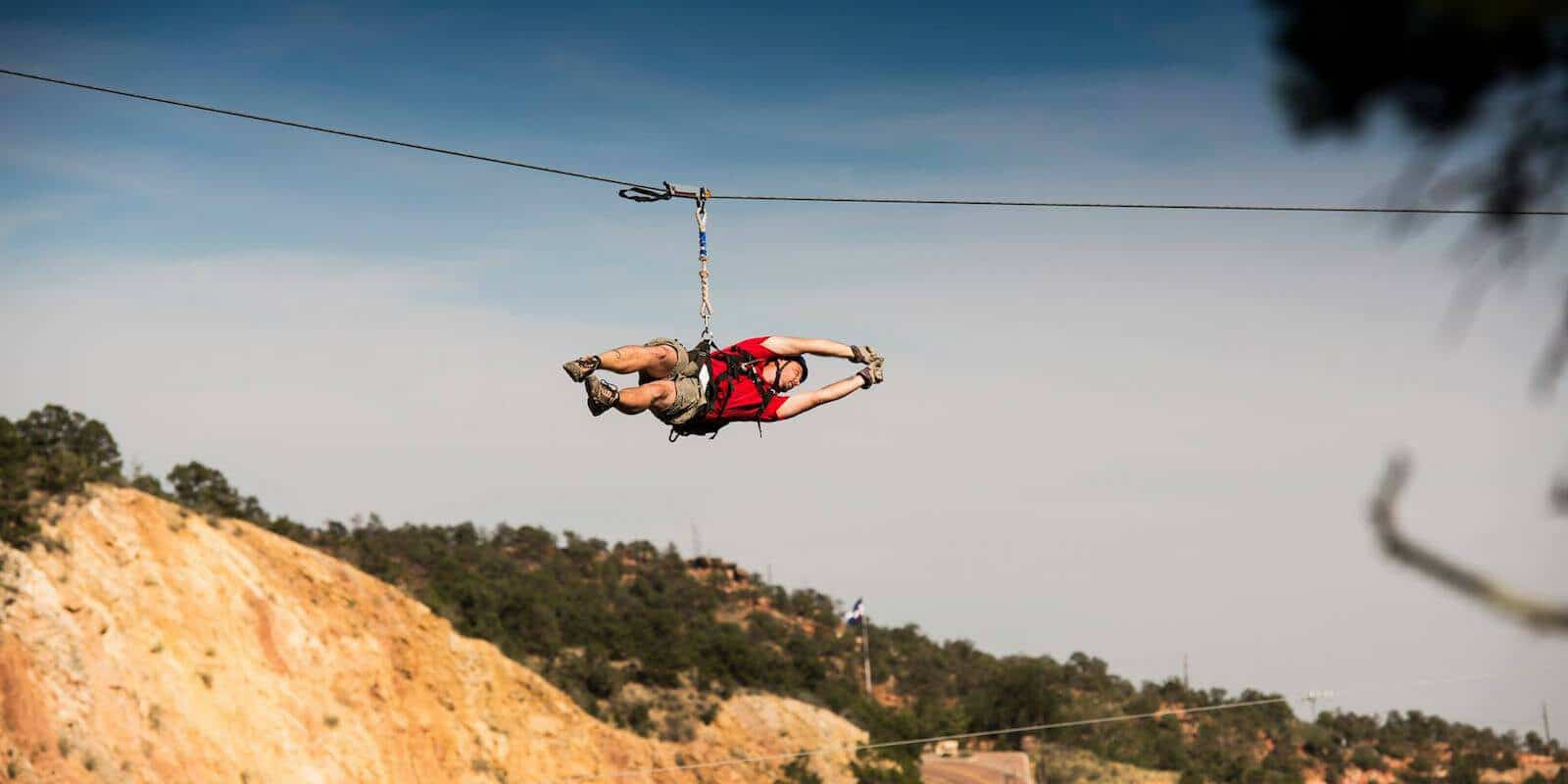 Image of a person on a zipline with Adventures Out West