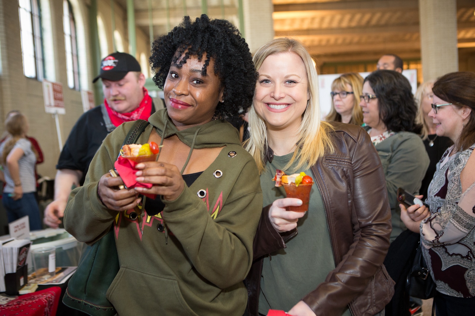 Image of two women enjoying bloody marys at the bloody mary festival