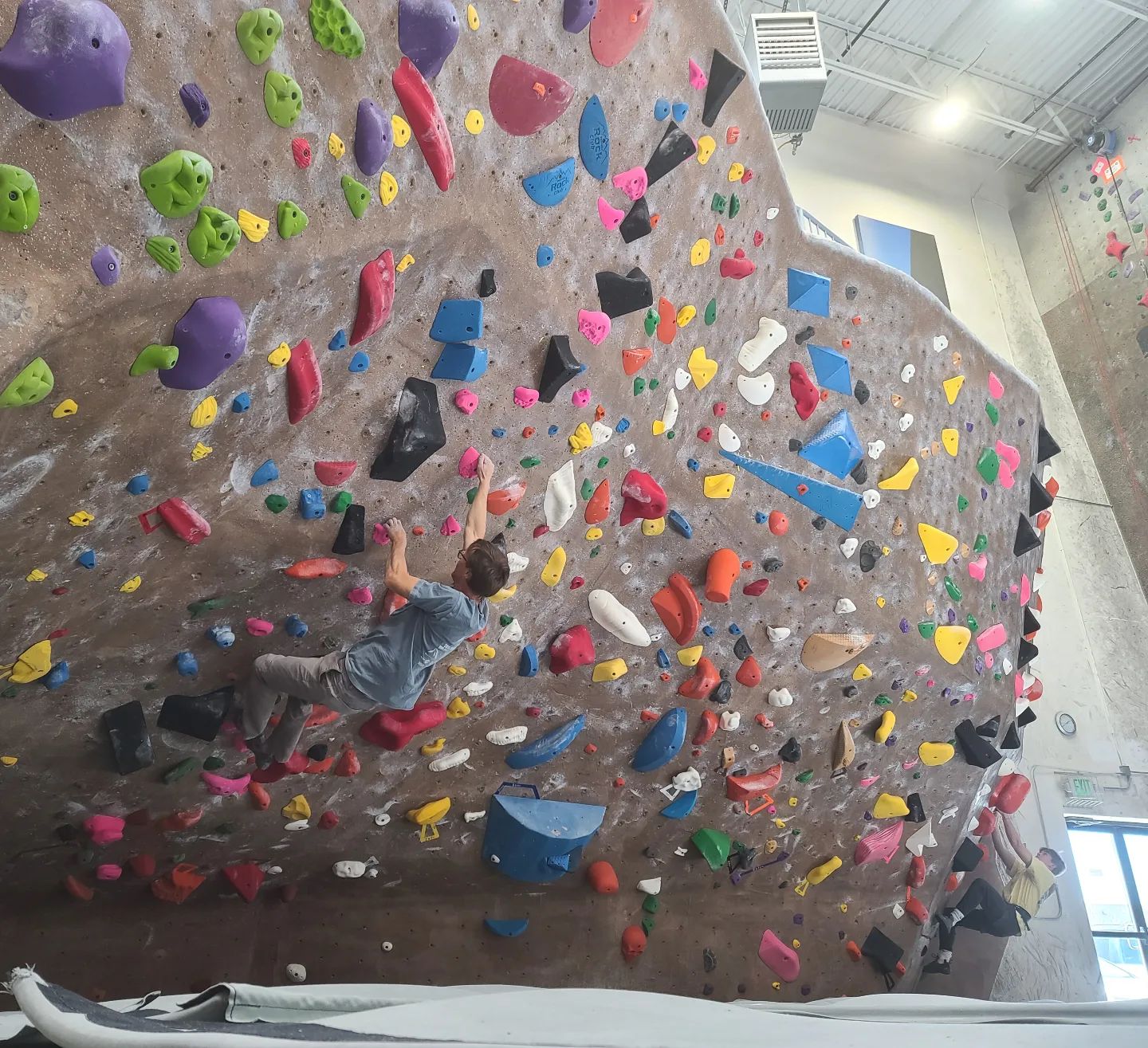 Image of a person bouldering at Boulder Rock Club in Boulder, Colorado