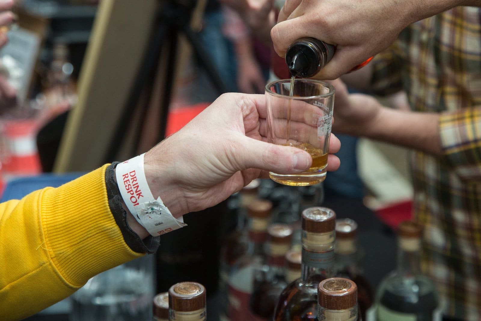 Image of a person pouring a sample at the Breckenridge Craft Spirits Festival in Colorado