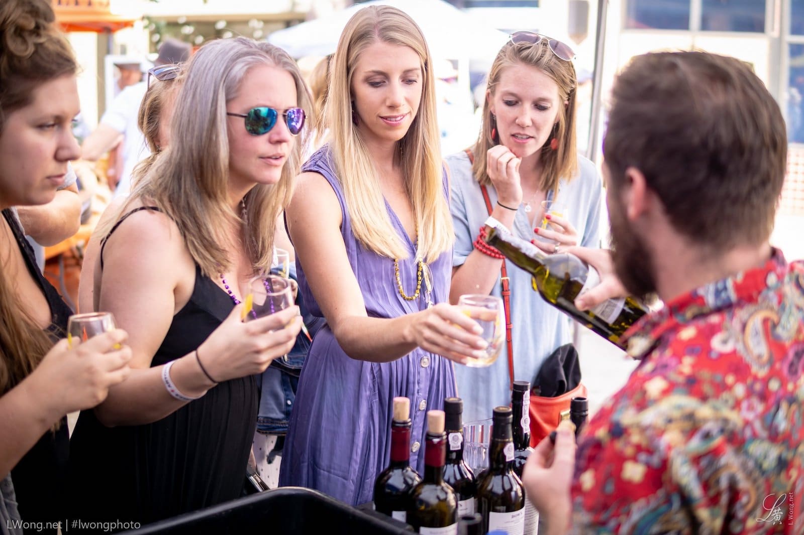 Image of a group of women sampling wine at the Breckenridge Food and Wine Festival in Colorado