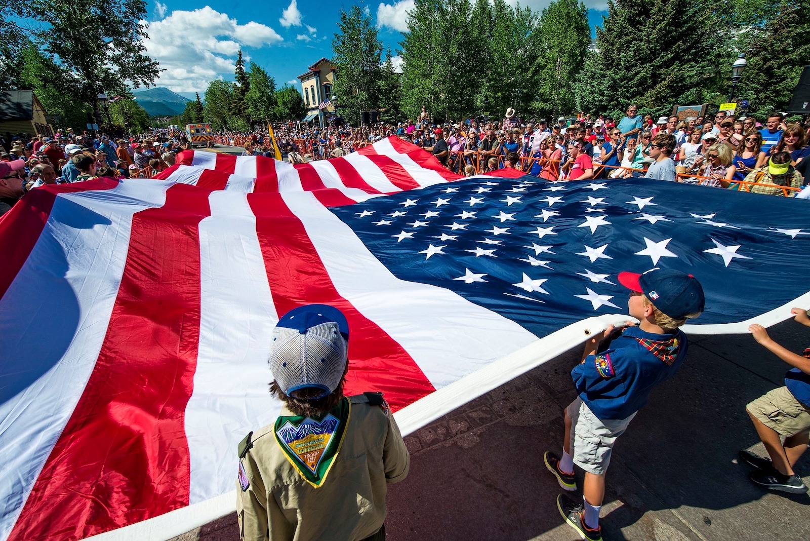 Image of kids holding the American flag for Independence Day in Breckenridge, Colorado