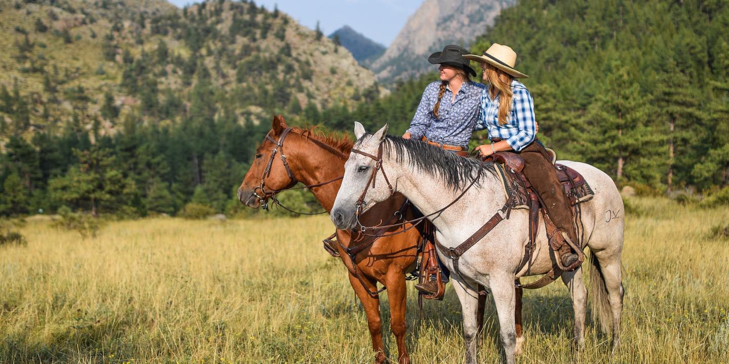 Image of two females riding horses at Cherokee Park Ranch in Livermore, CO