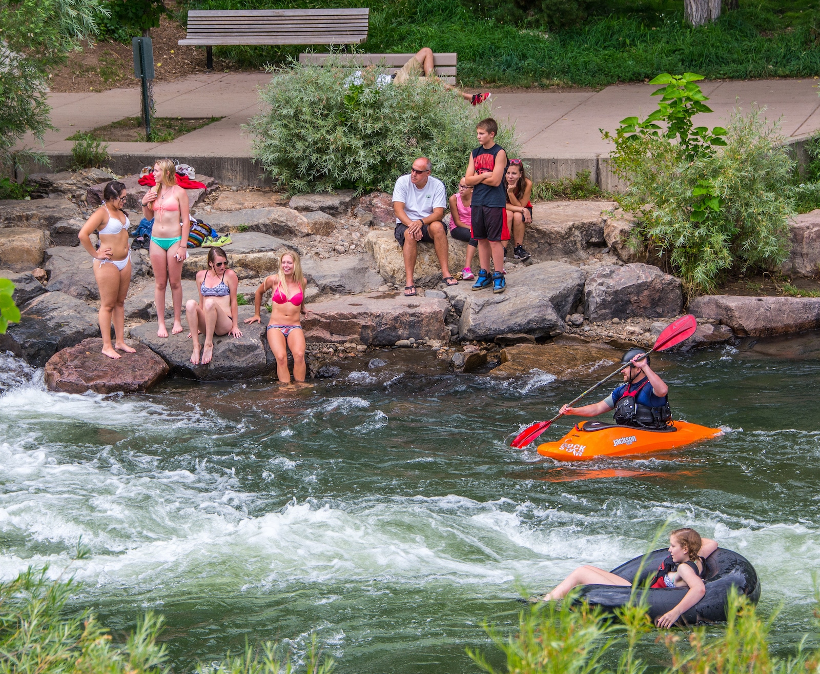 Tuber and Kayaker on Clear Creek in Golden CO Summer