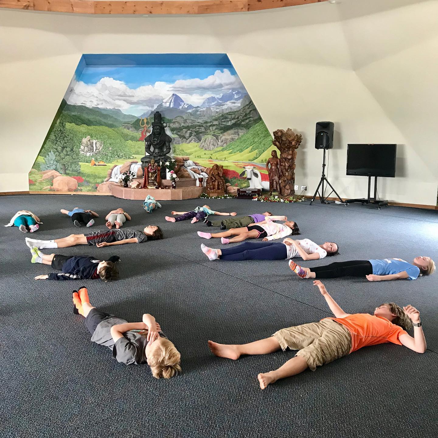 Image of kids doing yoga at Eldorado Mountain Yoga Ashram in Colorado