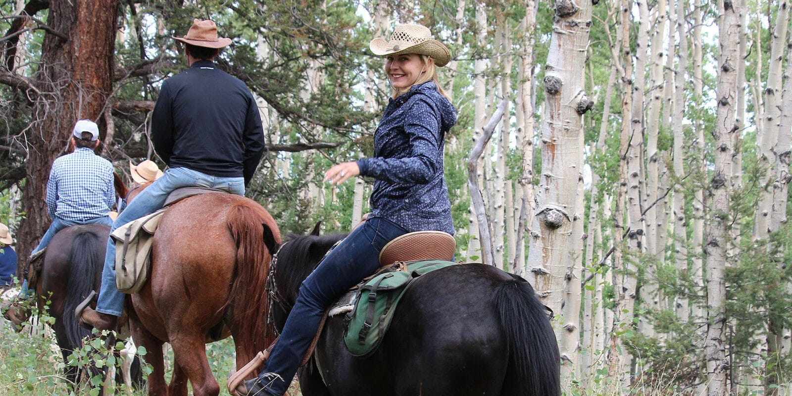 Image of people horseback riding at Elk Mountain Dude Ranch in Buena Vista, Colorado