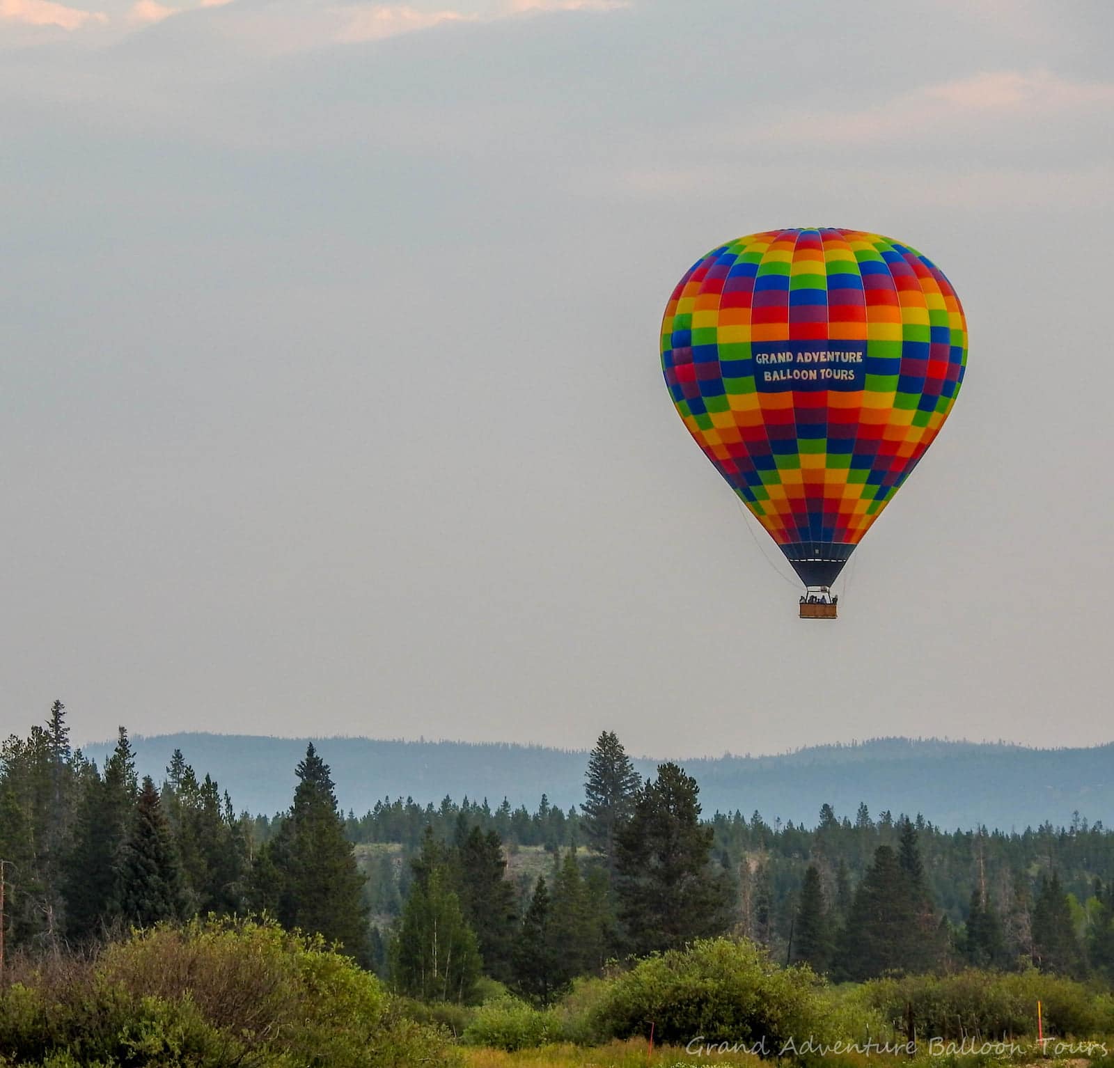 Image of a Grand Adventure Balloon Tours hot air balloon in Fraser, CO