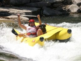 Gunnison River Festival Rafter on Banana Boat in Whitewater Park