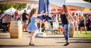 Image of people dancing at the Parker Oktoberfest in Colorado