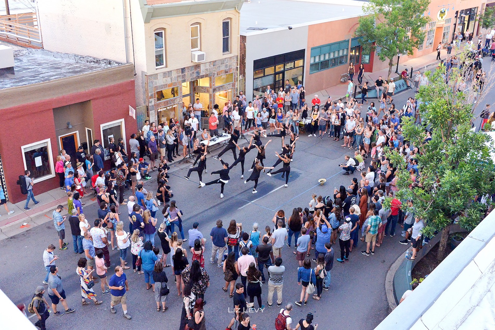 Image of people watching a dance performance at the Art District on Santa Fe in Denver, Colorado