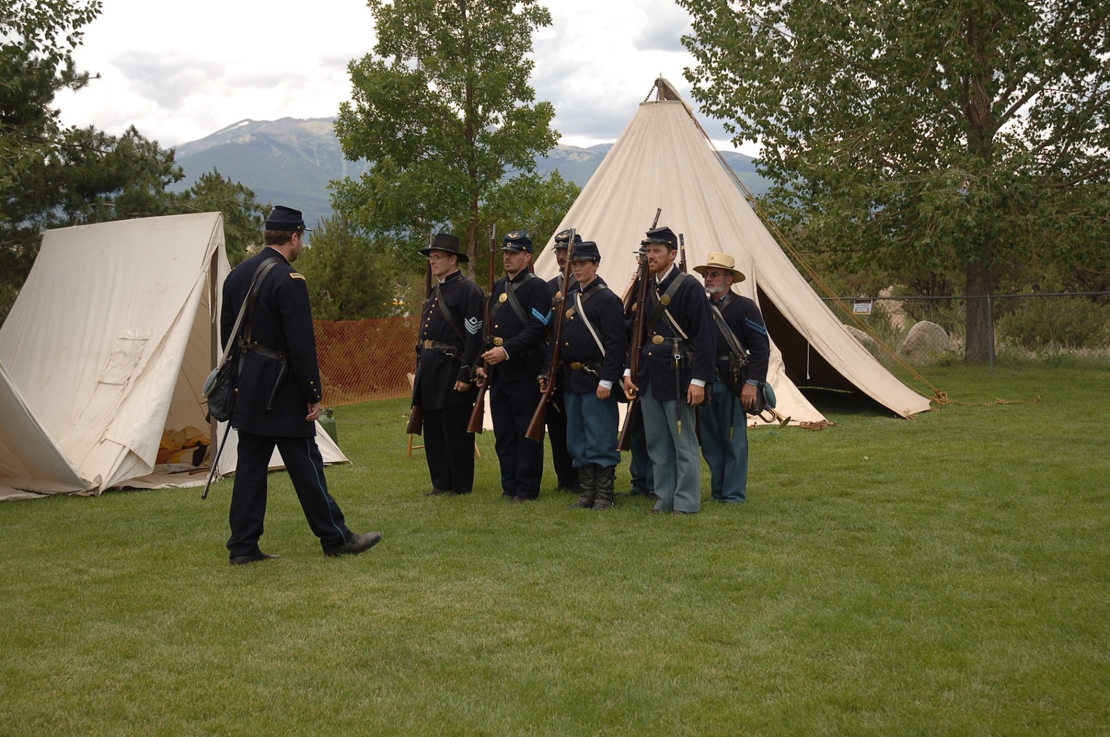 Image of people in the Gold Rush Days mock gunfire demonstration