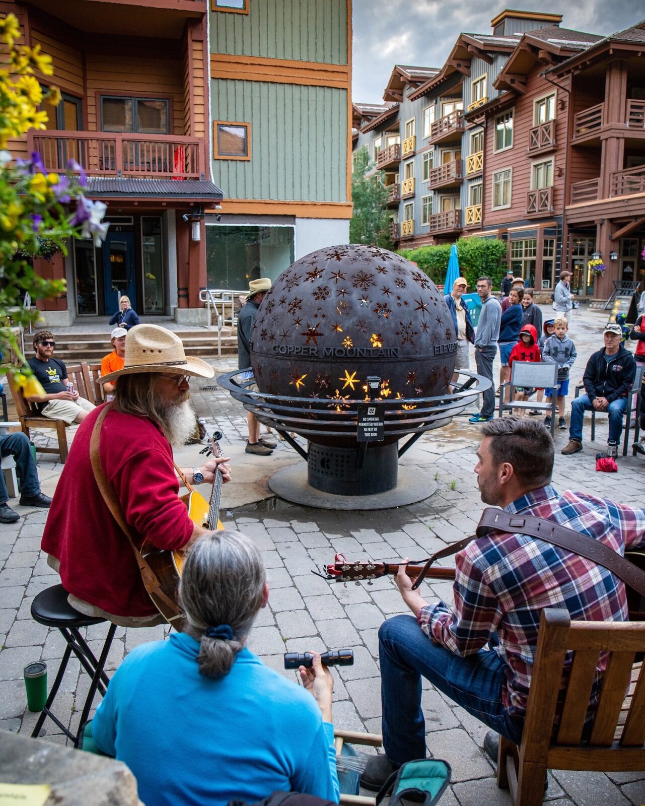 Image of people playing acoustic guitar at Copper Mountain, Colorado