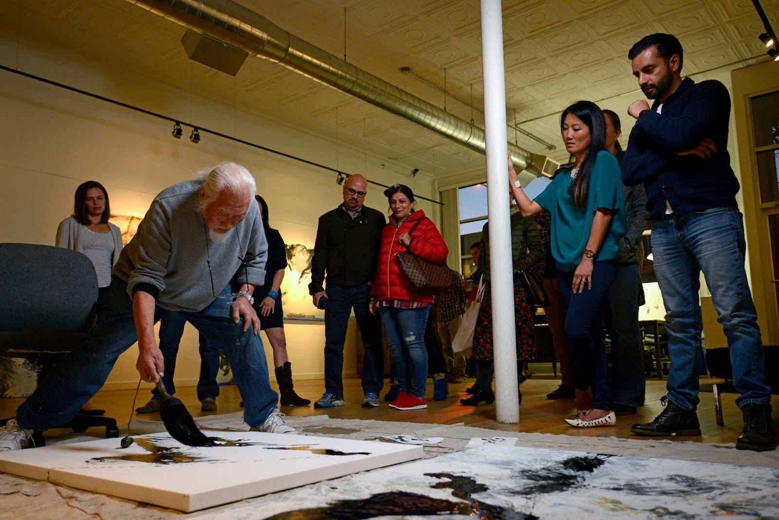 Image of a artist painting at Denver Arts Week 2017 in Colorado