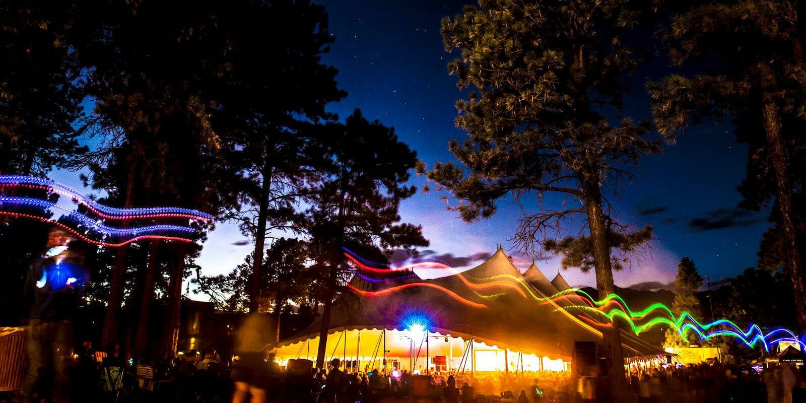 Image of the tent at night at the Four Corners Folk Festival in Pagosa Springs, Colorado