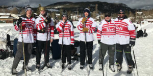 Image of some of the players from the Pond Hockey Classic in Grand Lake, Colorado