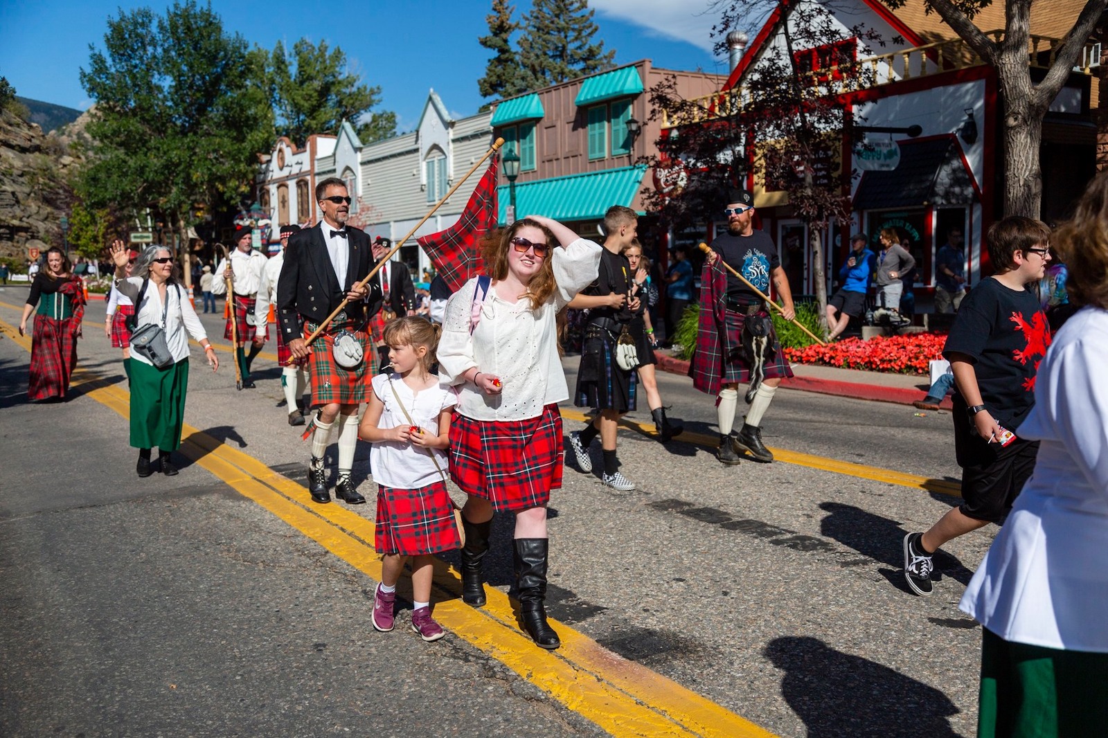 Image of people walking in the Long's Peak Scottish-Irish Highland Festival parade in Estes Park, Colorado