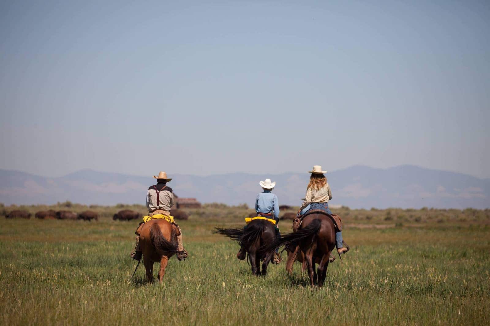 Image of people riding horses at Ranchlands Zapata Ranch in Mosca, Colorado