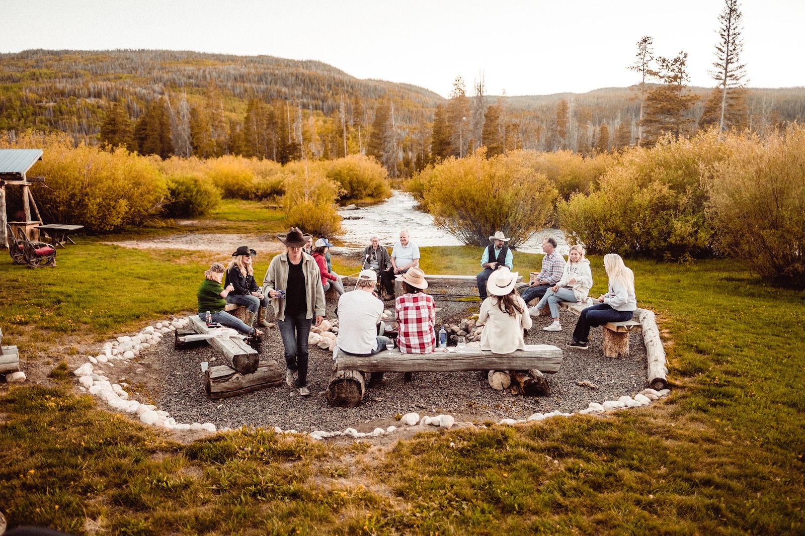 Image of people around the campfire at Rawah Guest Ranch in Glendevey, ColoradoColorado