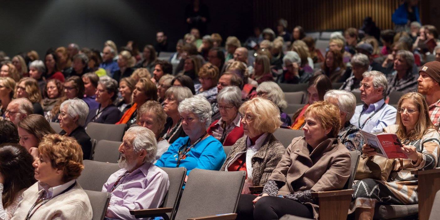 Image of people in the auditorium at the Rocky Mountain Women's Film Festival in Colorado