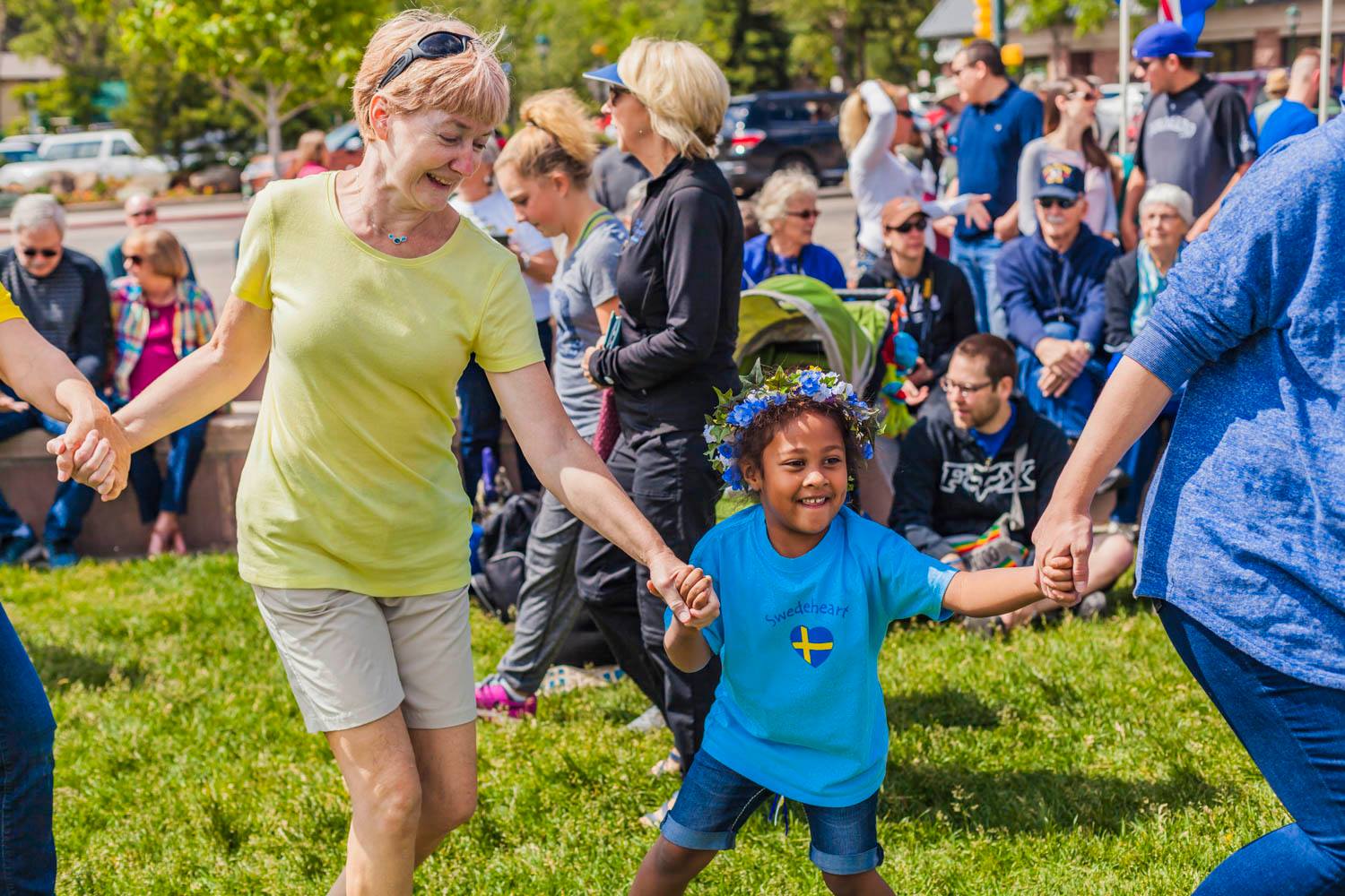 Image of people dancing at the Scandinavian Midsummer Festival in Estes Park, Colorado