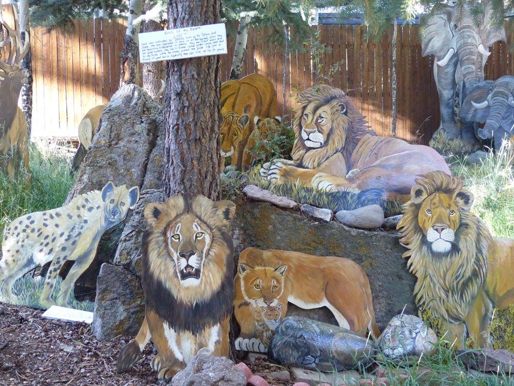 Image of painted big cats at Sweet's Wildlife Preserve Art Zoo in Lake City, Colorado