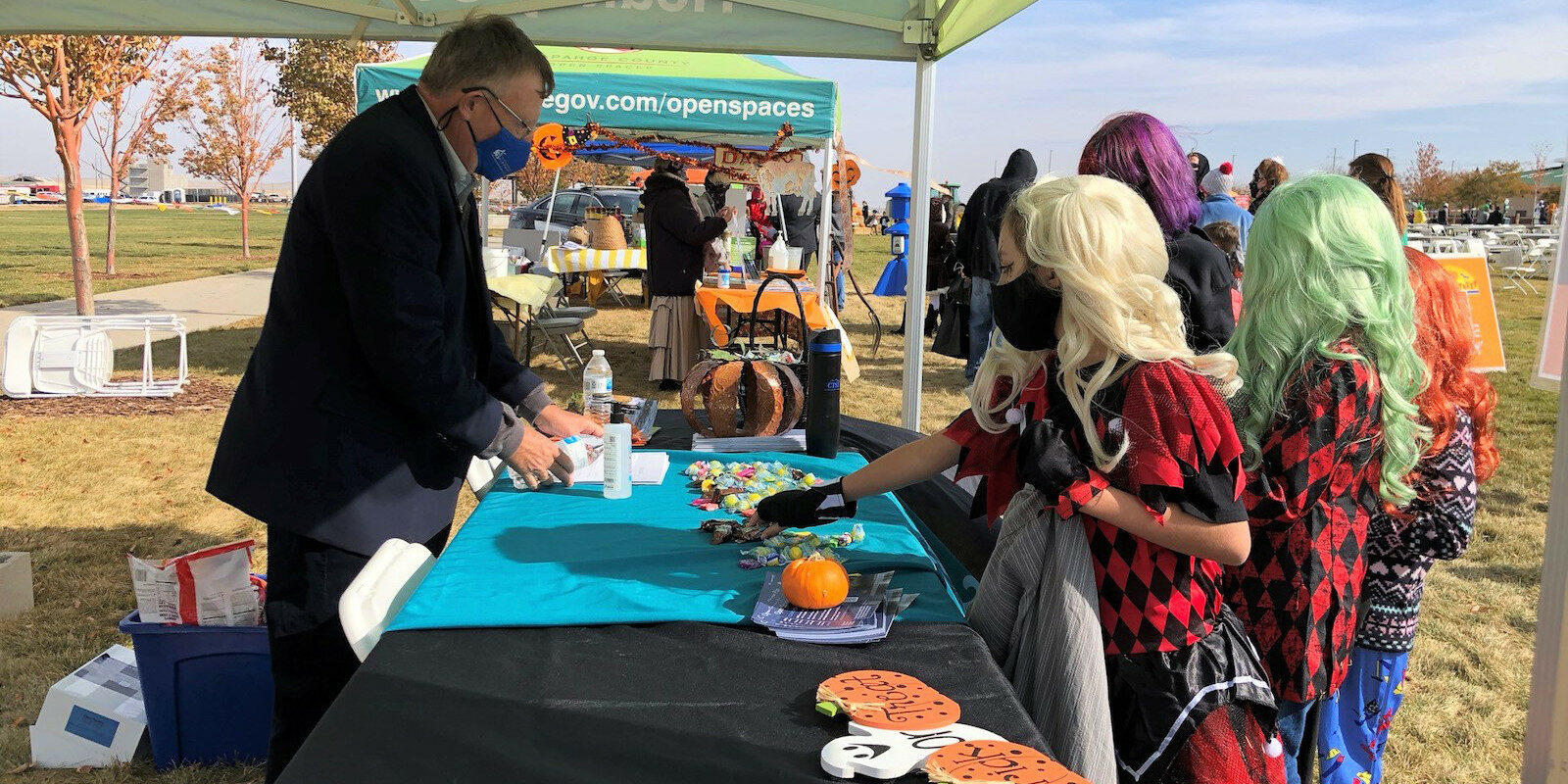 Image of children trick-or-treating at Arapahoe County Fairgrounds in Aurora, Colorado