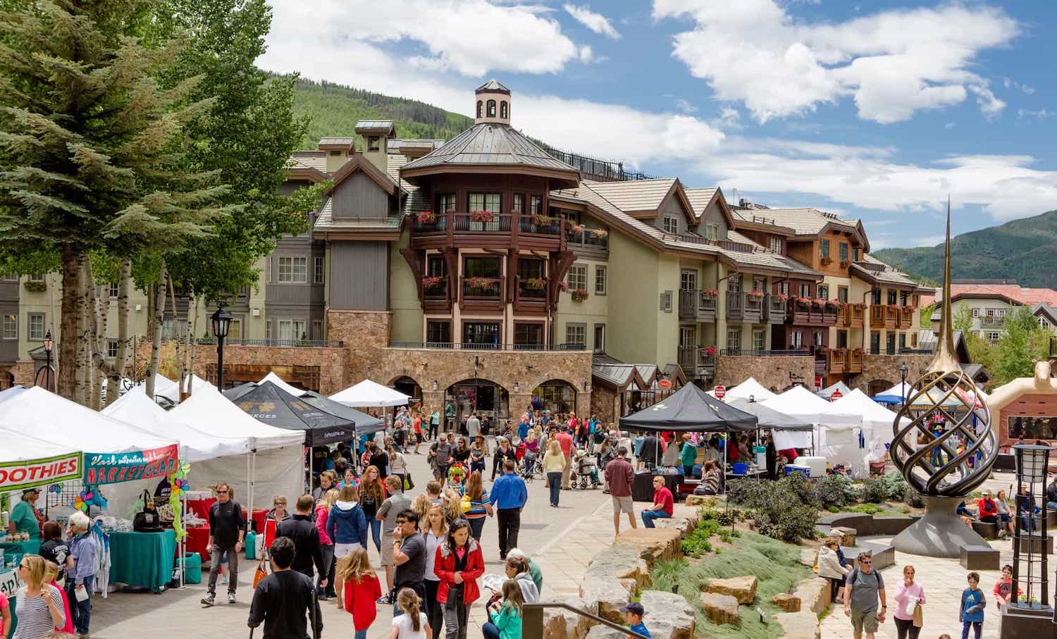 Image of people and booths at the Vail Farmer's Market in Colorado