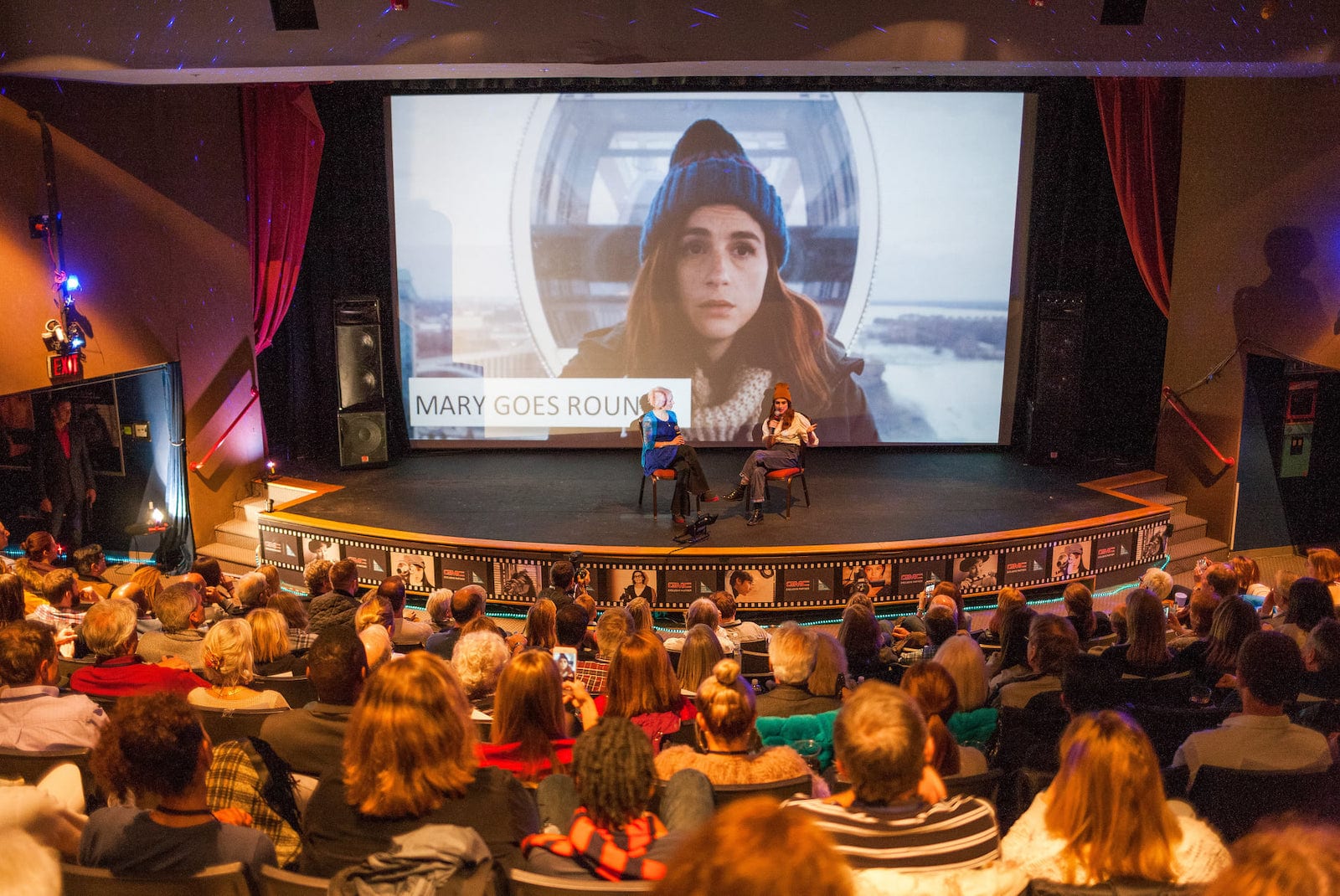 Image of people on stage having a conversation about "Mary Goes Round" at the Vail Film Festival