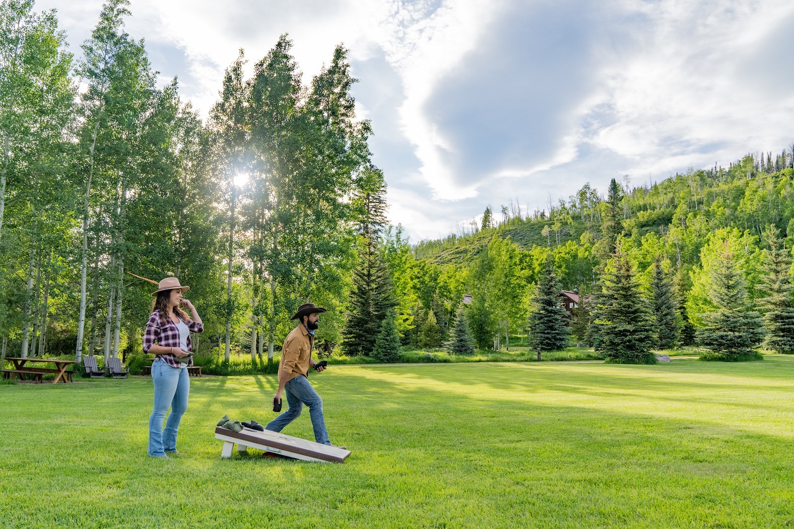 Image of people playing corn hole at Vista Verde Ranch in Clark, Colorado