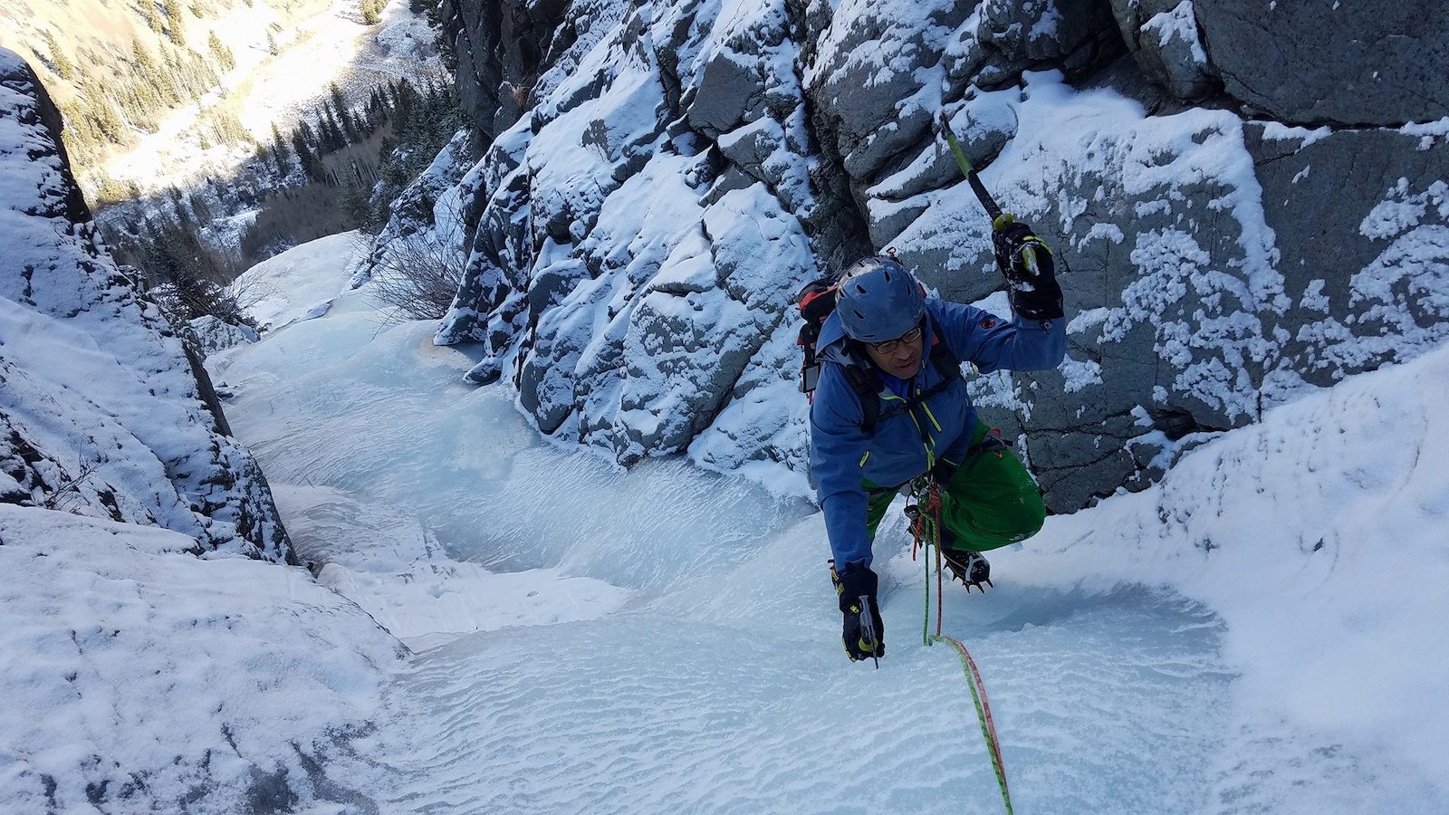 Image of a person ice climbing with the Colorado Climbing Company