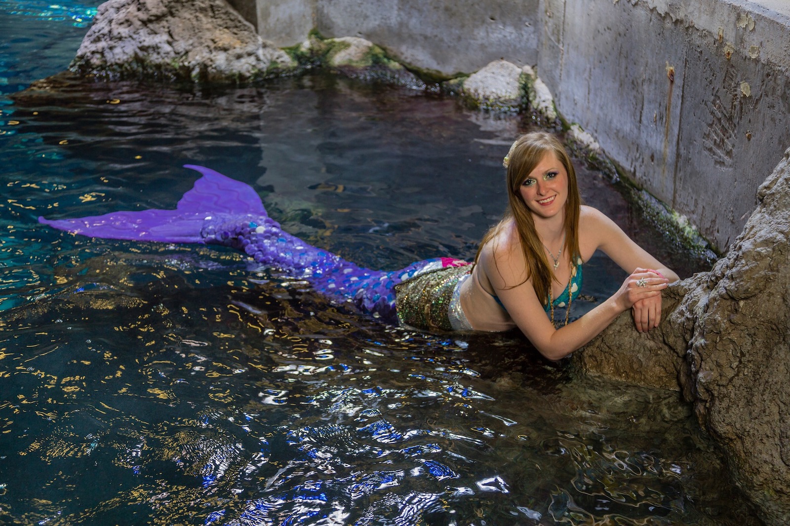 Image of a woman dressed as a mermaid at the Downtown Aquarium in Denver, Colorado