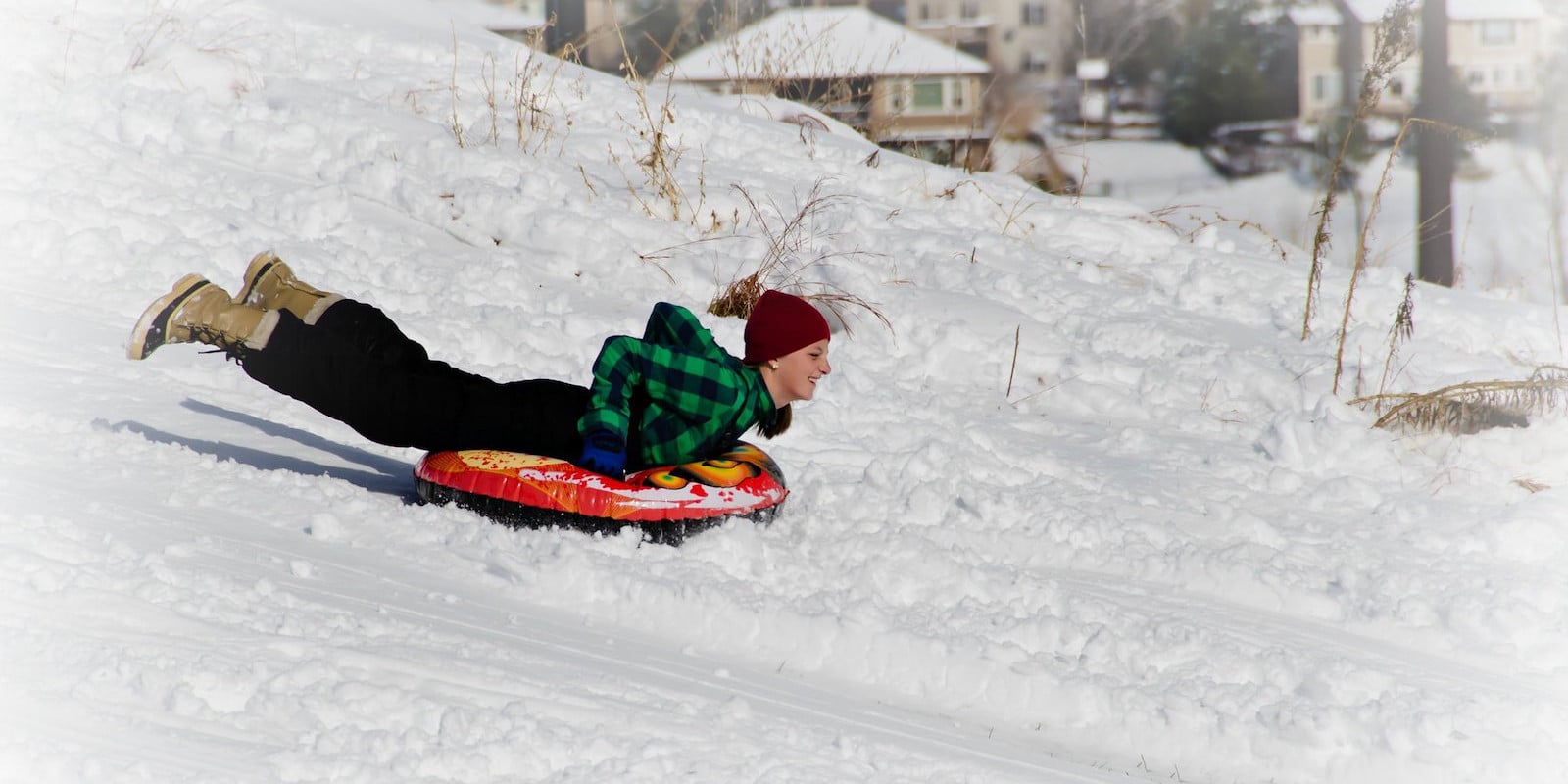 Image of a person snow tubing in Littleton, Colorado