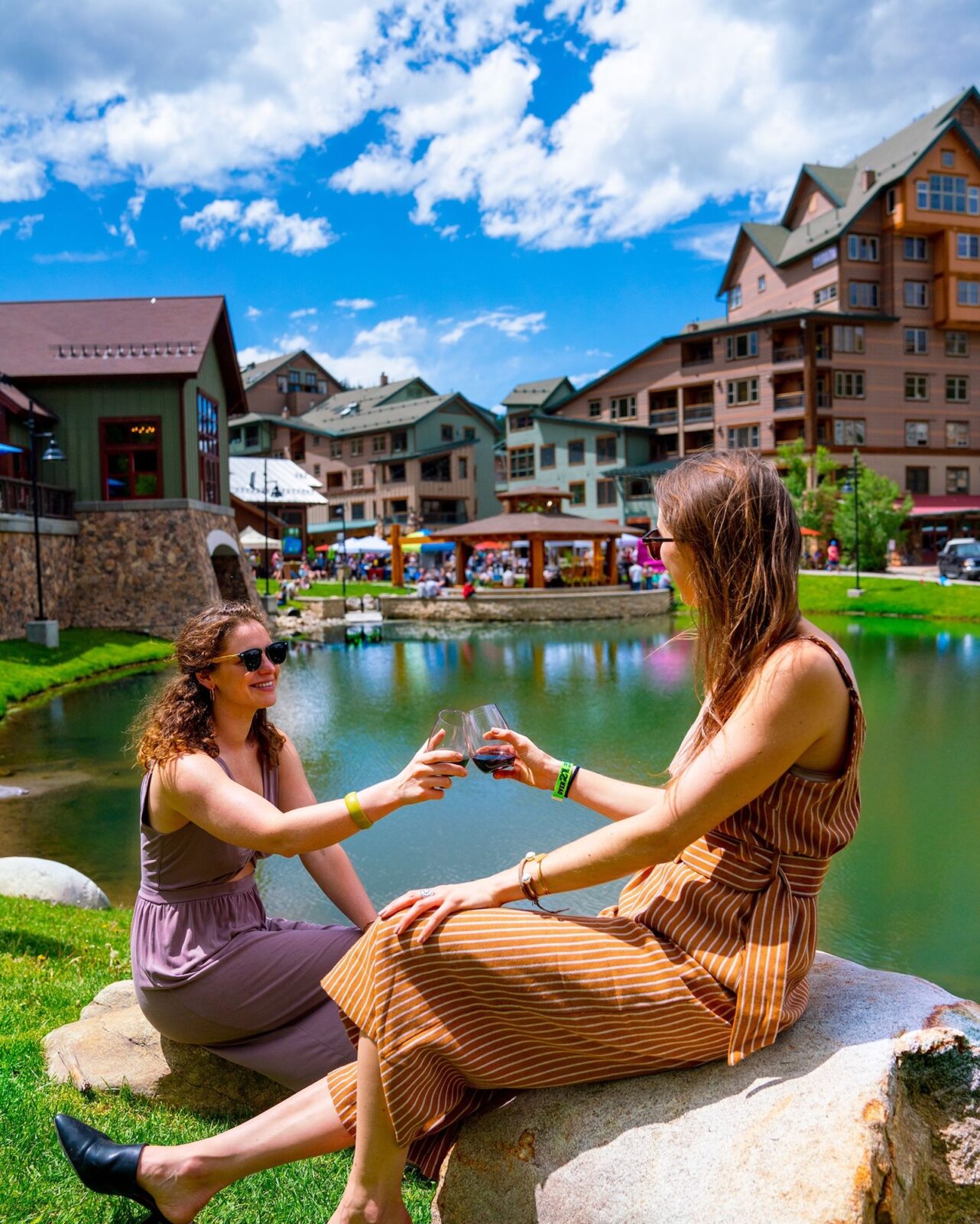 Image of two women enjoying wine at Village Uncorked in Winter Park, Colorado