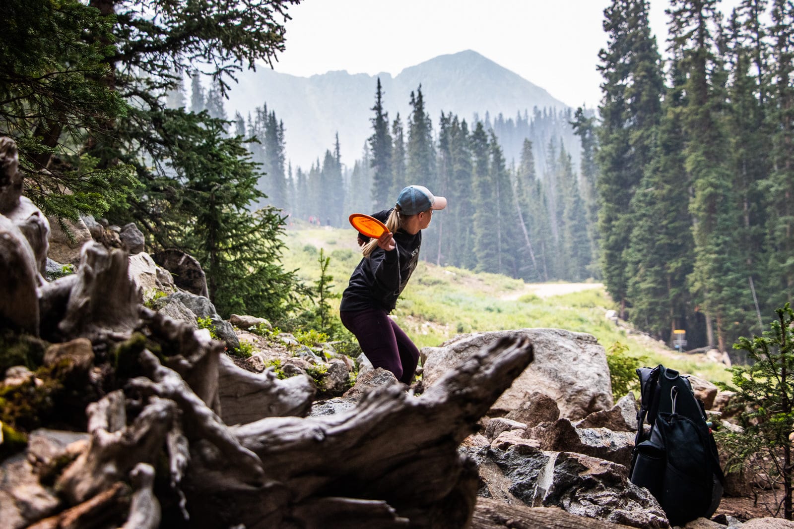 Image of a person playing disc golf at A-Basin in Colorado