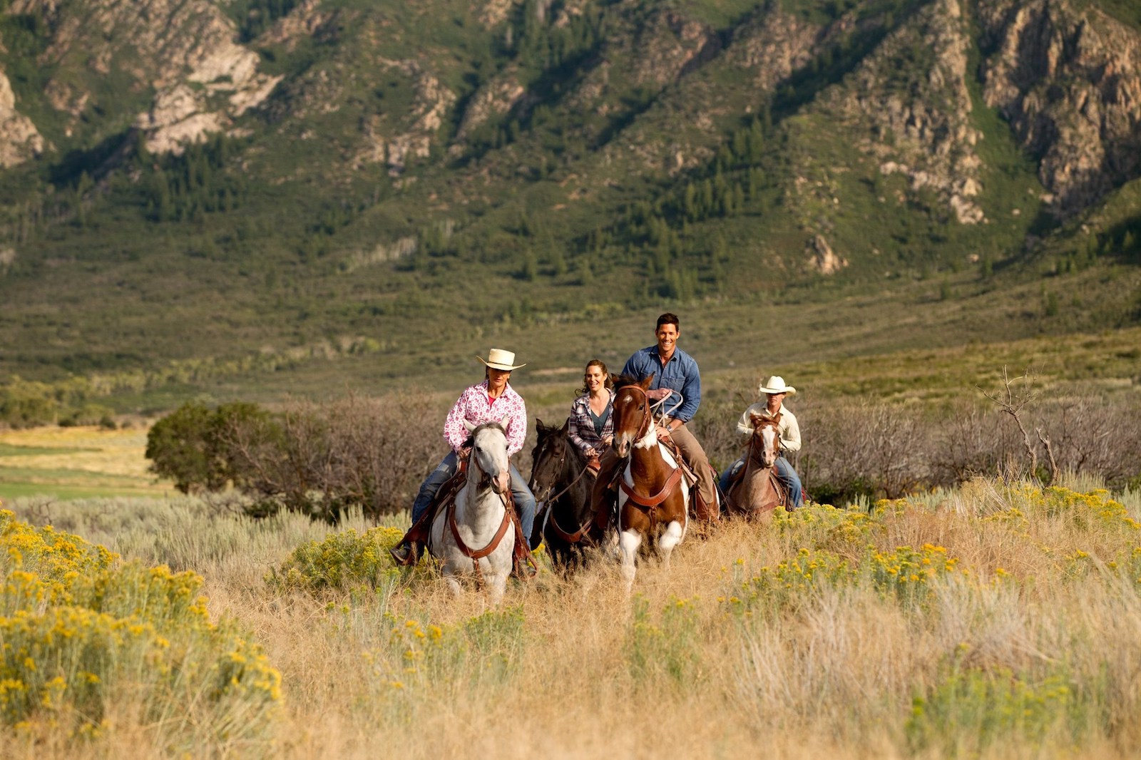 Image of people horseback riding at Gateway Canyons Resort & Spa in Colorado