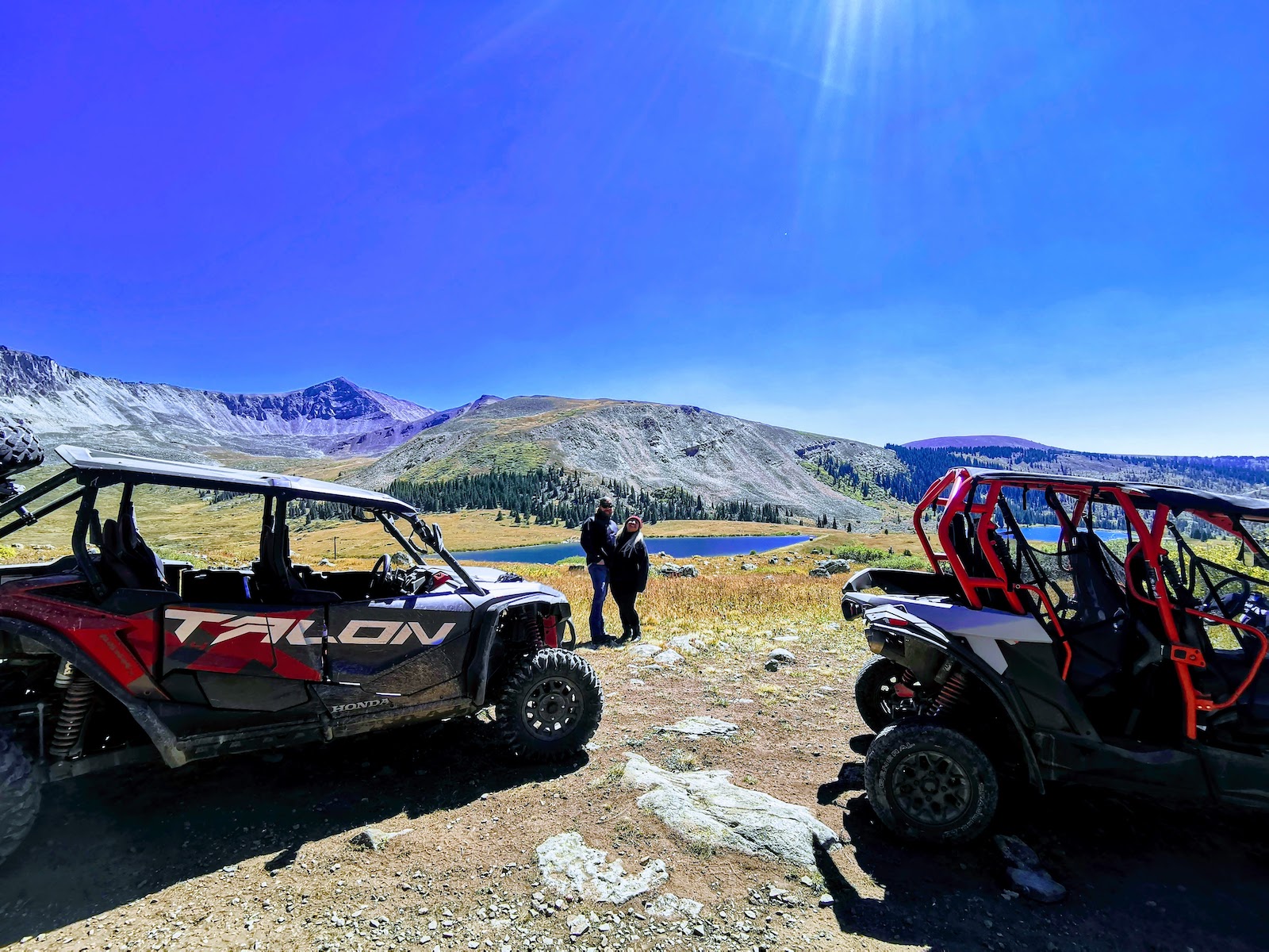 Image of a couple with two atvs in Leadville, Colorado