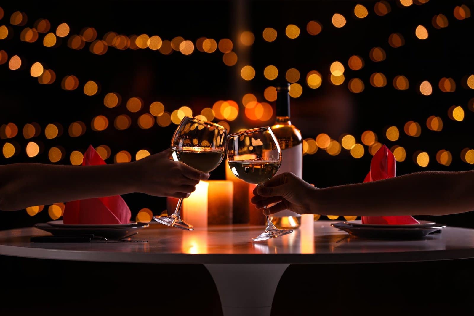 Image of people cheering two wine glasses at Jills Restaurant & Bistro at St Juliens Hotel & Spa in Boulder, CO