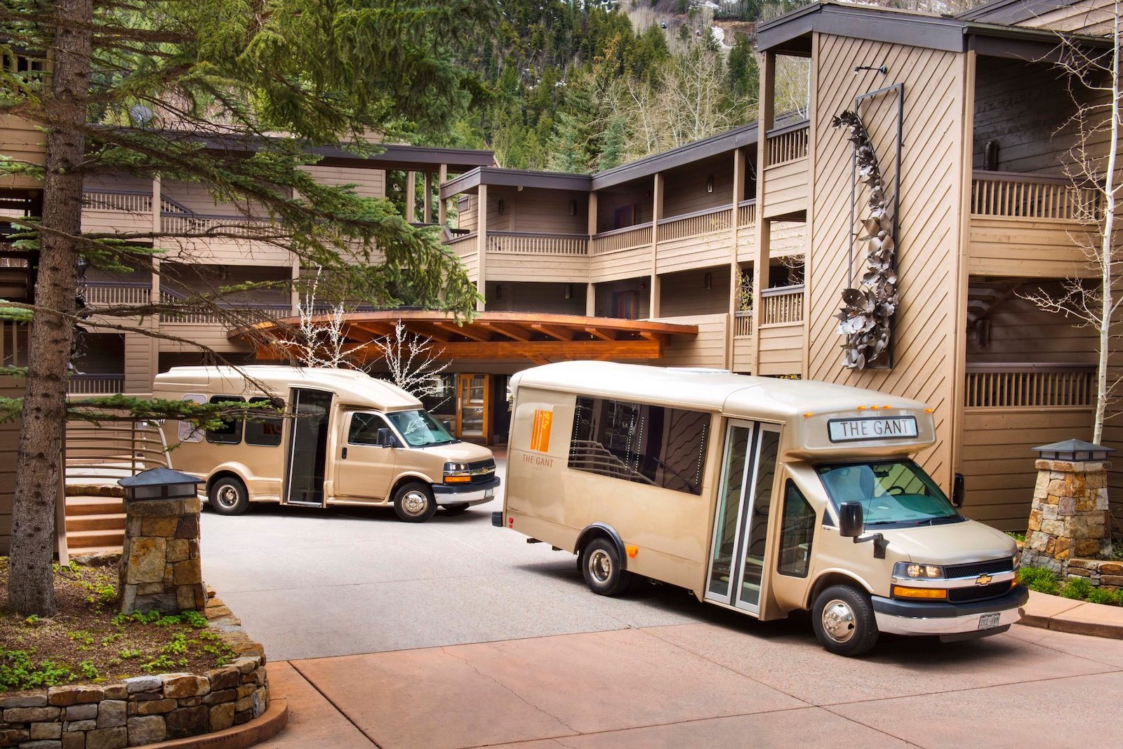 Image of shuttle buses outside of The Gant in Aspen, Colorado