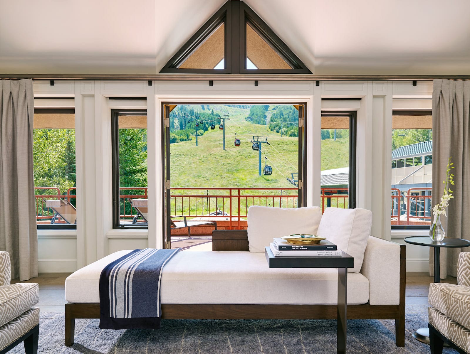 Image of a bed at The Little Nell in Aspen, Colorado looking at the slopes