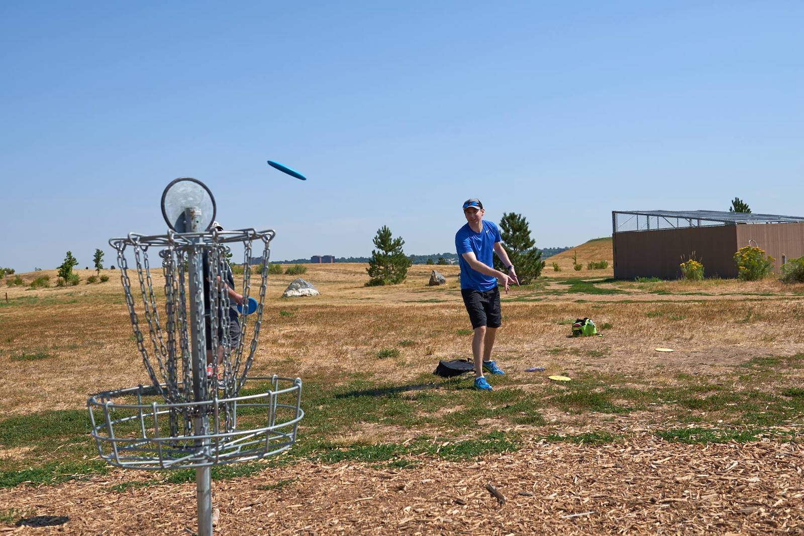 Image of a person playing at Village Greens in Greenwood Village, Colorado