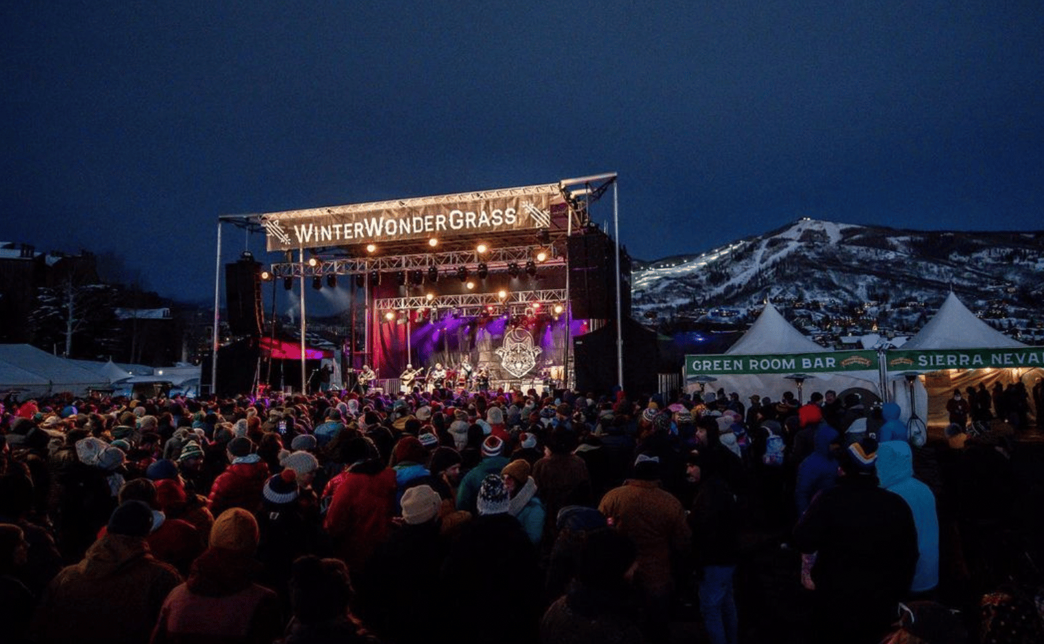 Main stage at a large outdoor winter music festival