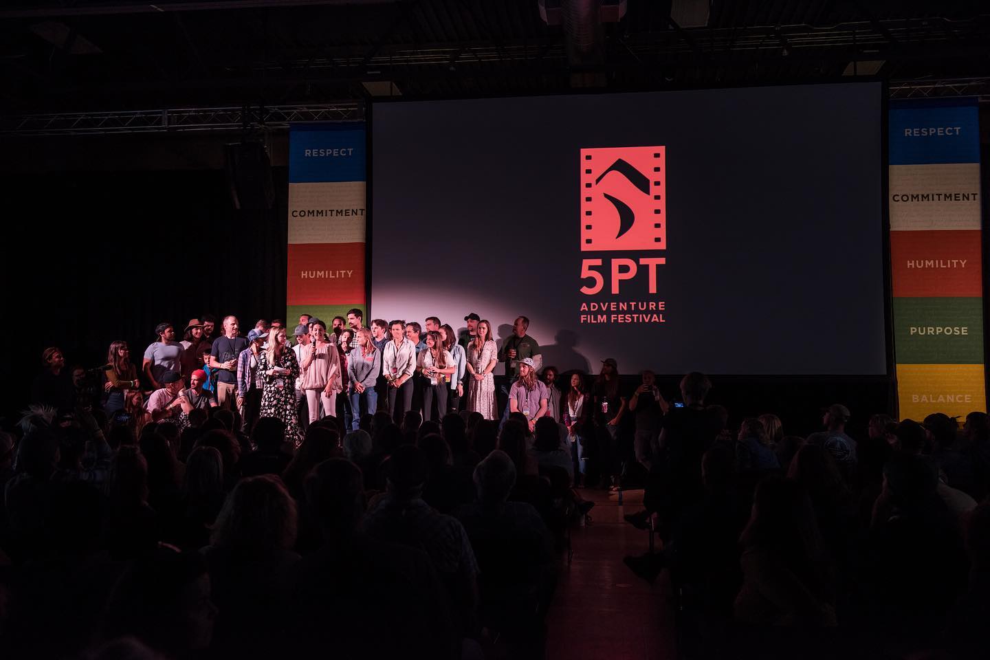 Image of speakers on stage at the 5Point Film Festival in Carbondale, Colorado