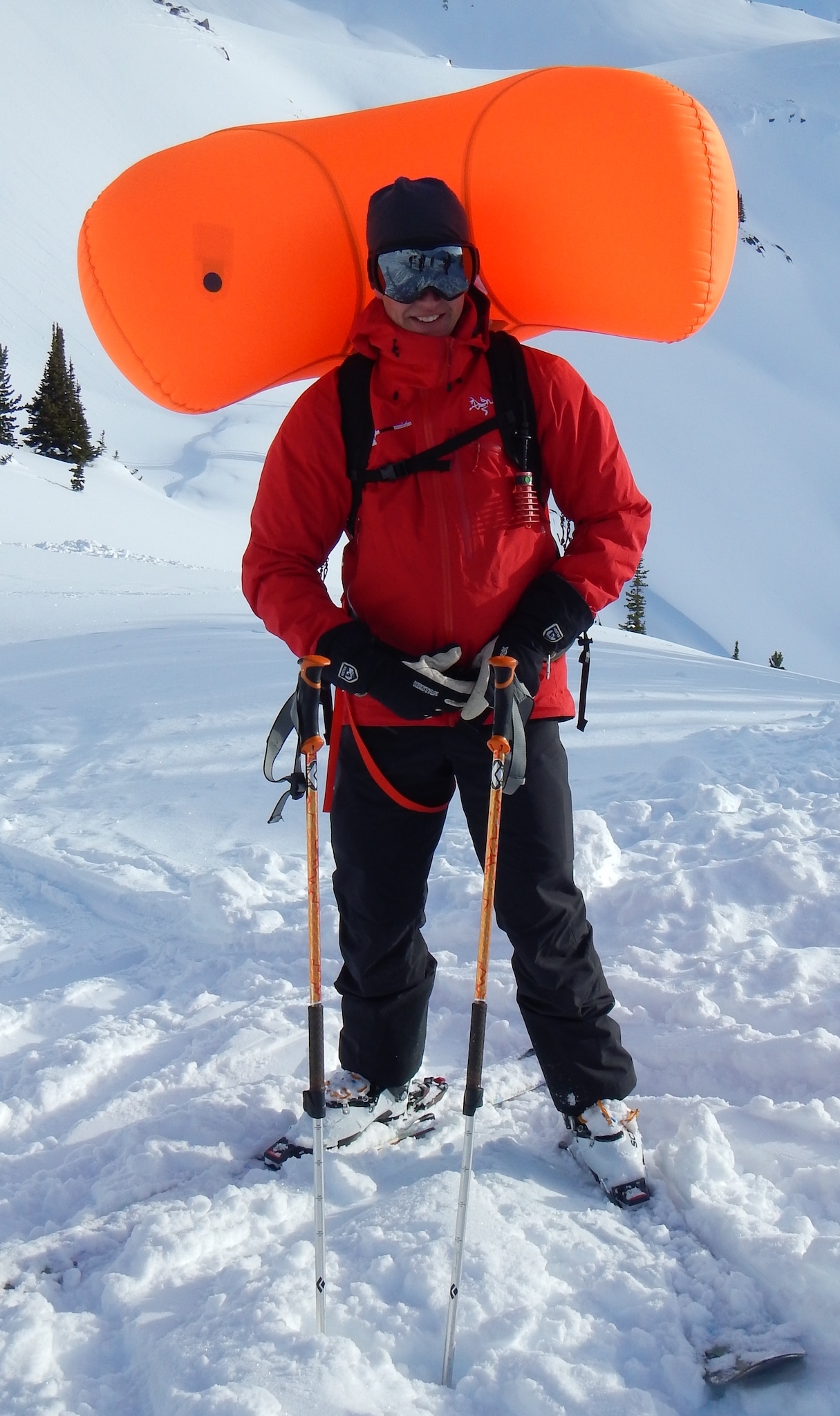 Person with avalanche air bag deployed