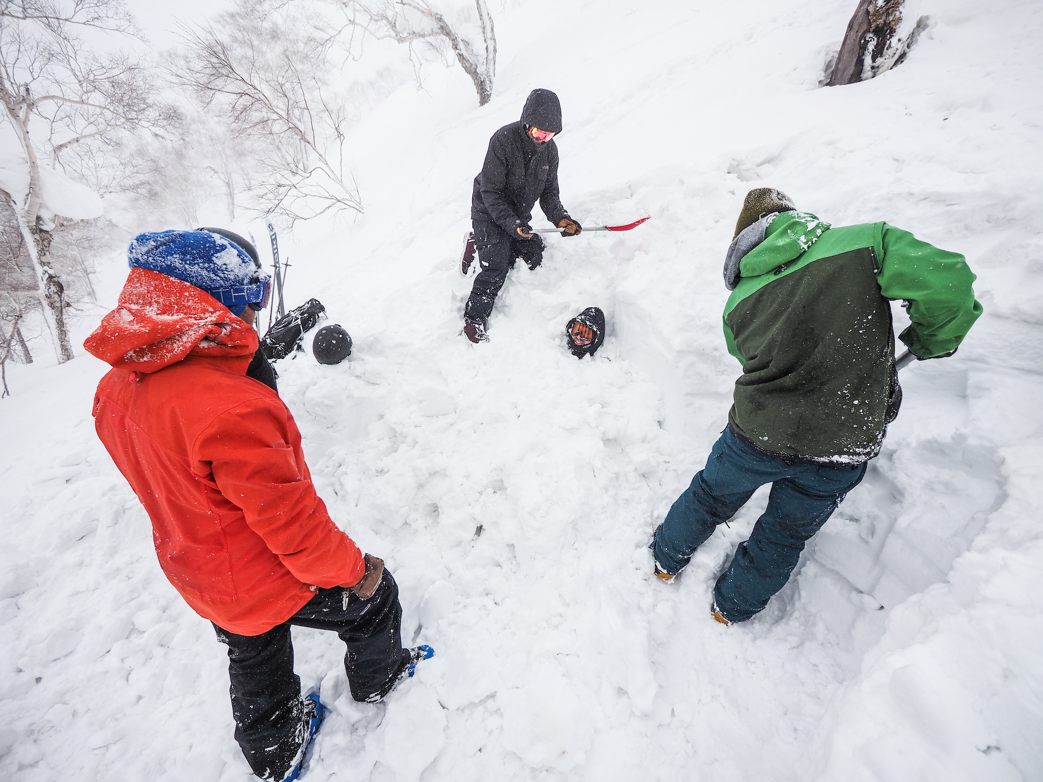 People participating in avalanche safety training
