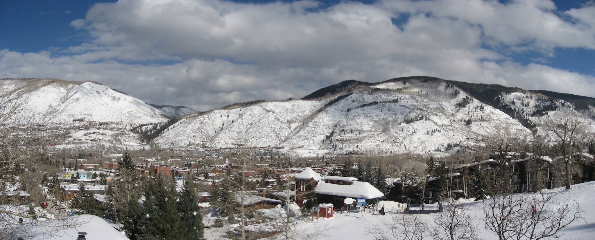 A snowy view of Aspen, Colorado from the base of Aspen Ski Mountain.