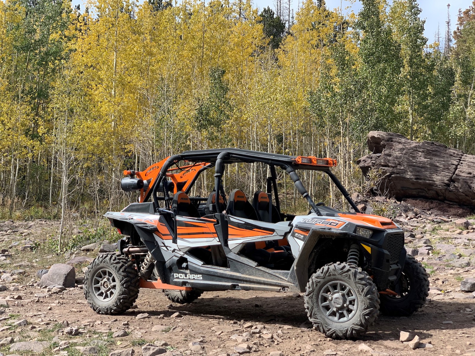 Image of a Collegiate Peaks Off-Road orange Polaris RZR