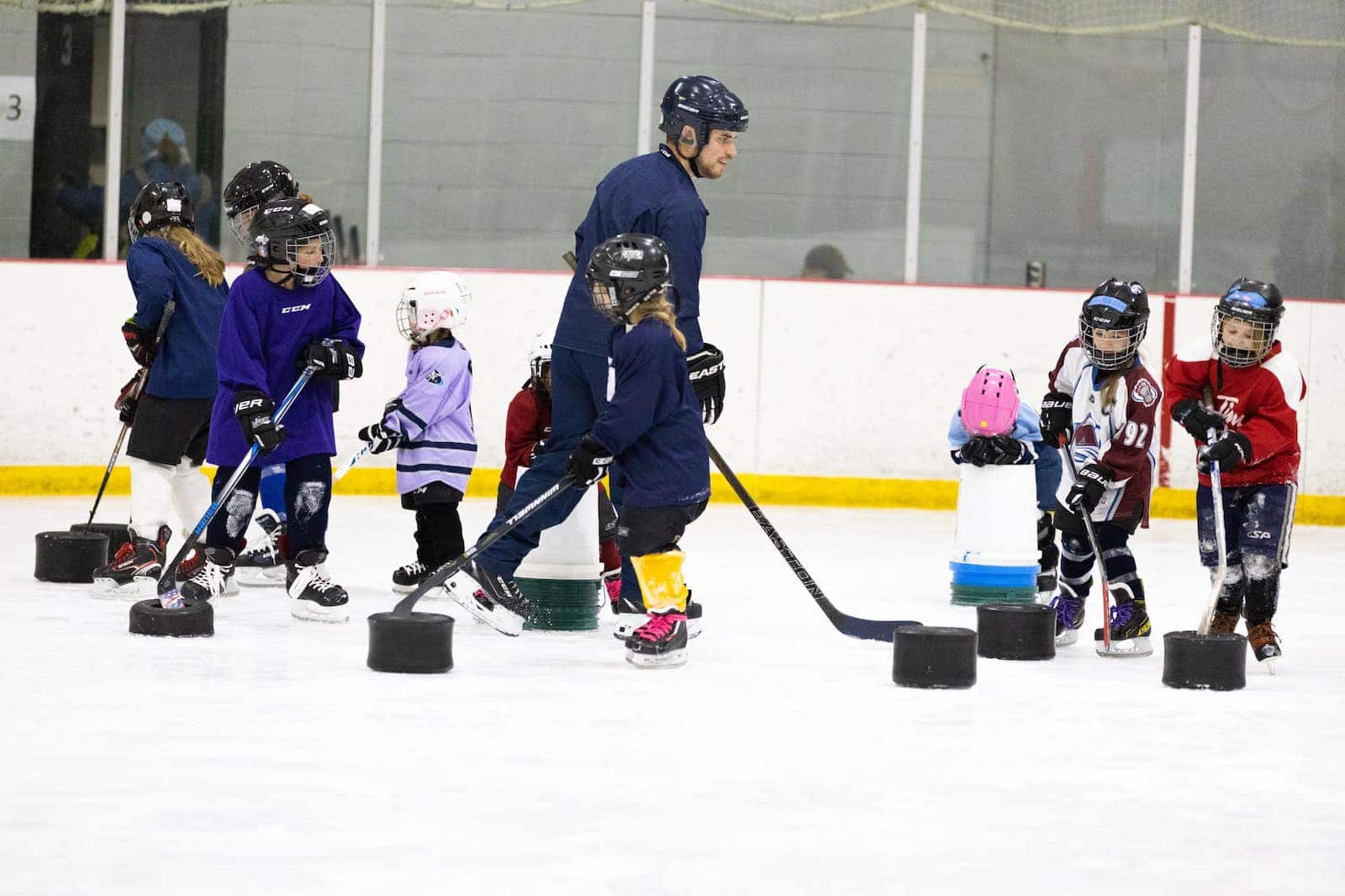 Image of the Girls Club hockey practice at Monument Ice Rinks in Colorado