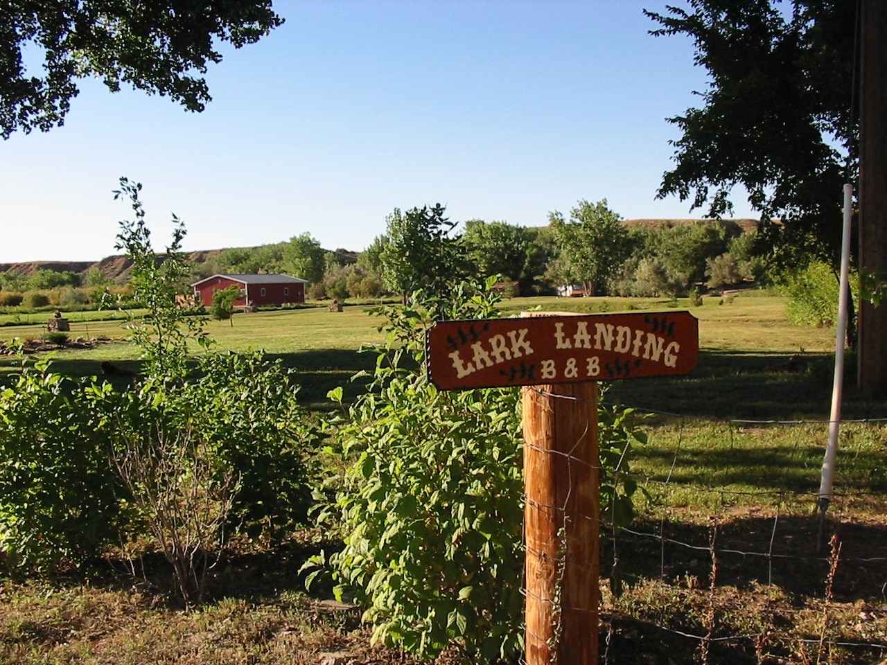 Wooden Lark Landing B&B sign